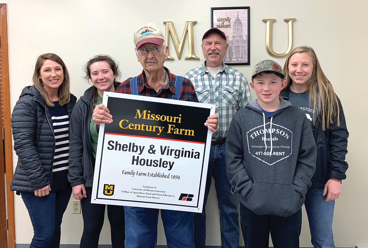 The family of Shelby Housley celebrate the designation of a Century Farm. The year of the Century Farm acquisition was 1894 with 456 acres in Norwood. Great-grandfather, James Housley, was the original owner.